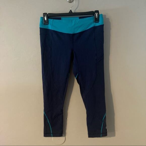 Lululemon Wet Dry Warm Crop Leggings - Size 6, Navy/Teal, Mesh Ventilation - Picture 1 of 4